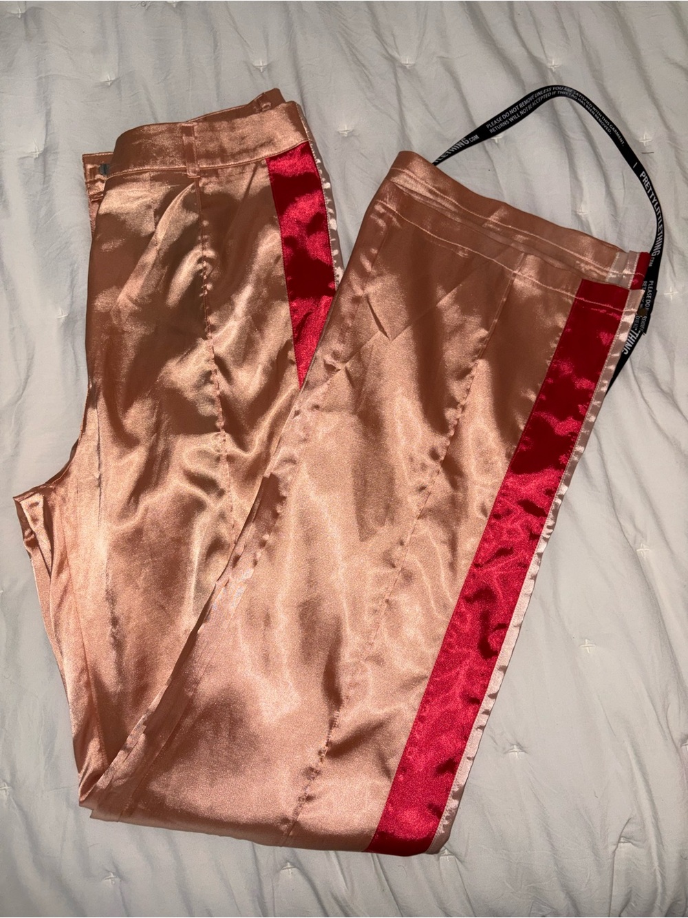 PrettyLittleThing Satin Wide Leg Trousers in Rose Gold with Red Side Stripe